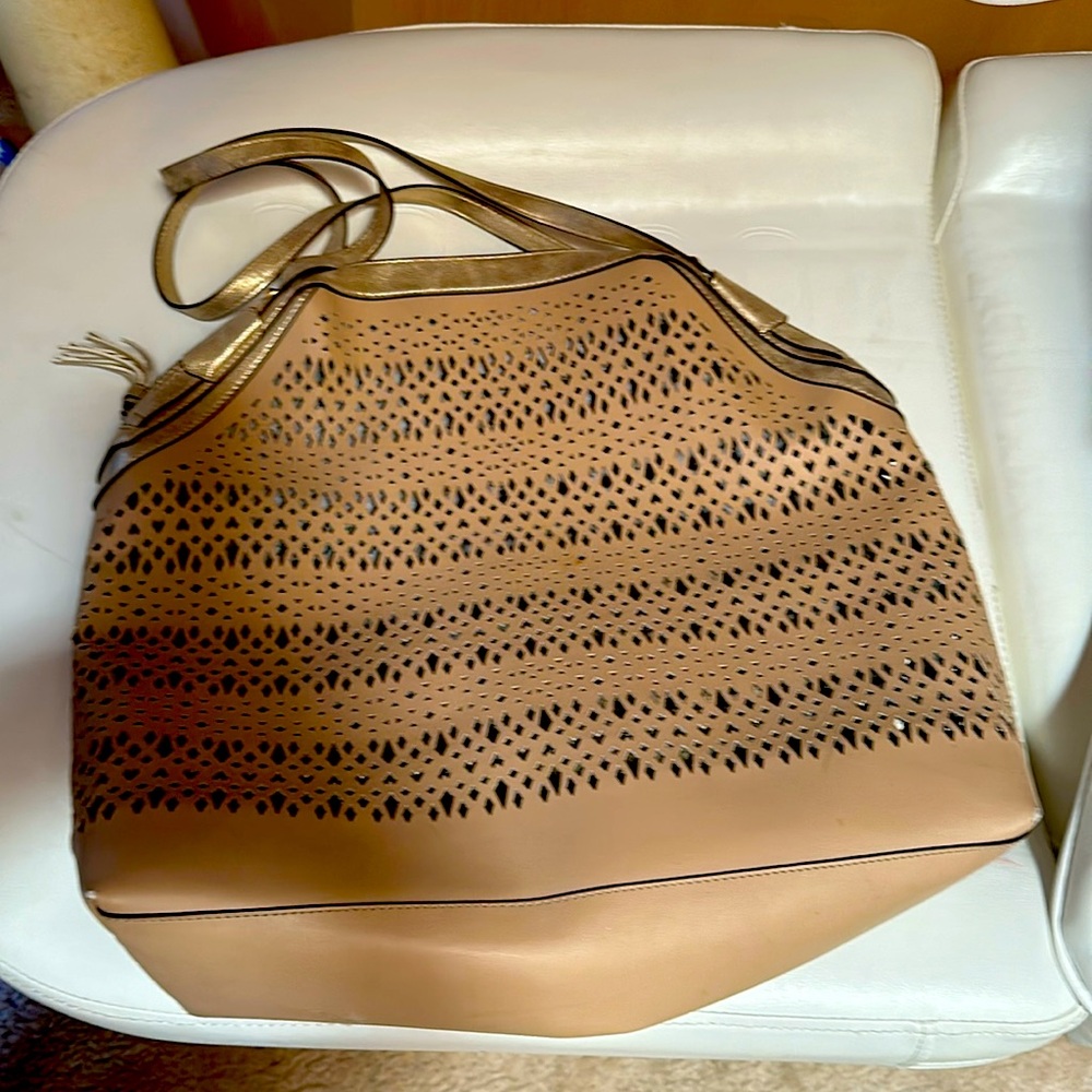 Stella and Dot purse like new inside a stain but like brand new